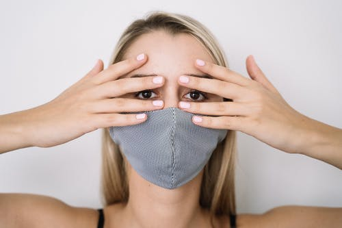A woman wearing a facemask
