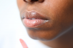 A Woman’s Shiny and Slightly Tinted Lips