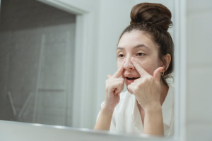 Woman using a cleanser